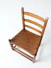 antique ladder back chair with woven seat