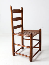 antique ladder back chair with woven seat