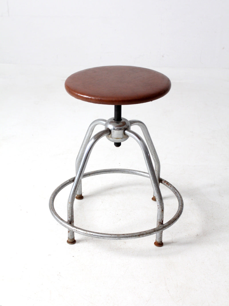 mid century UMF swivel seat stool