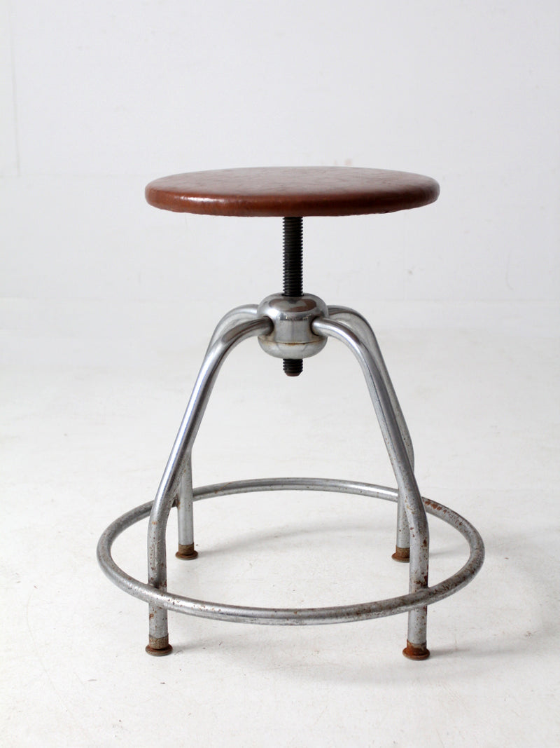 mid century UMF swivel seat stool