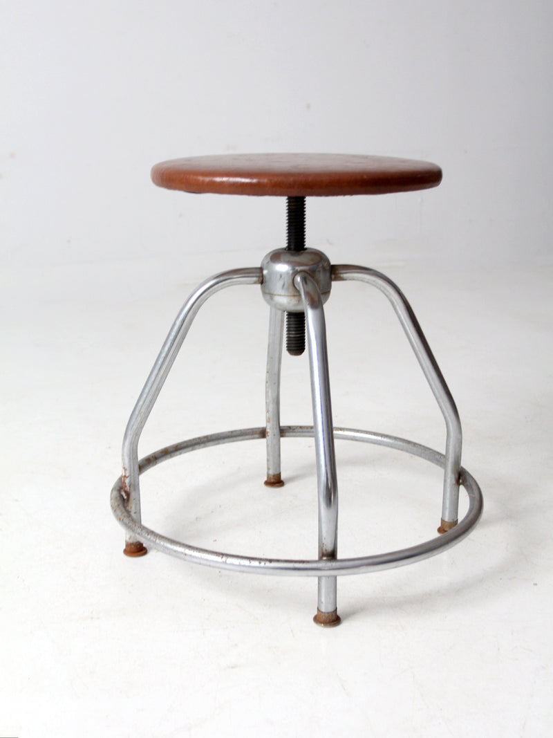 mid century UMF swivel seat stool