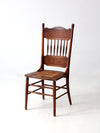 antique pressed back chair with cane seat