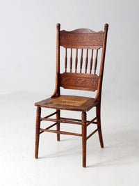 antique pressed back chair with cane seat