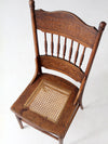 antique pressed back chair with cane seat