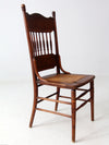 antique pressed back chair with cane seat