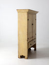 antique primitive bead-board cabinet