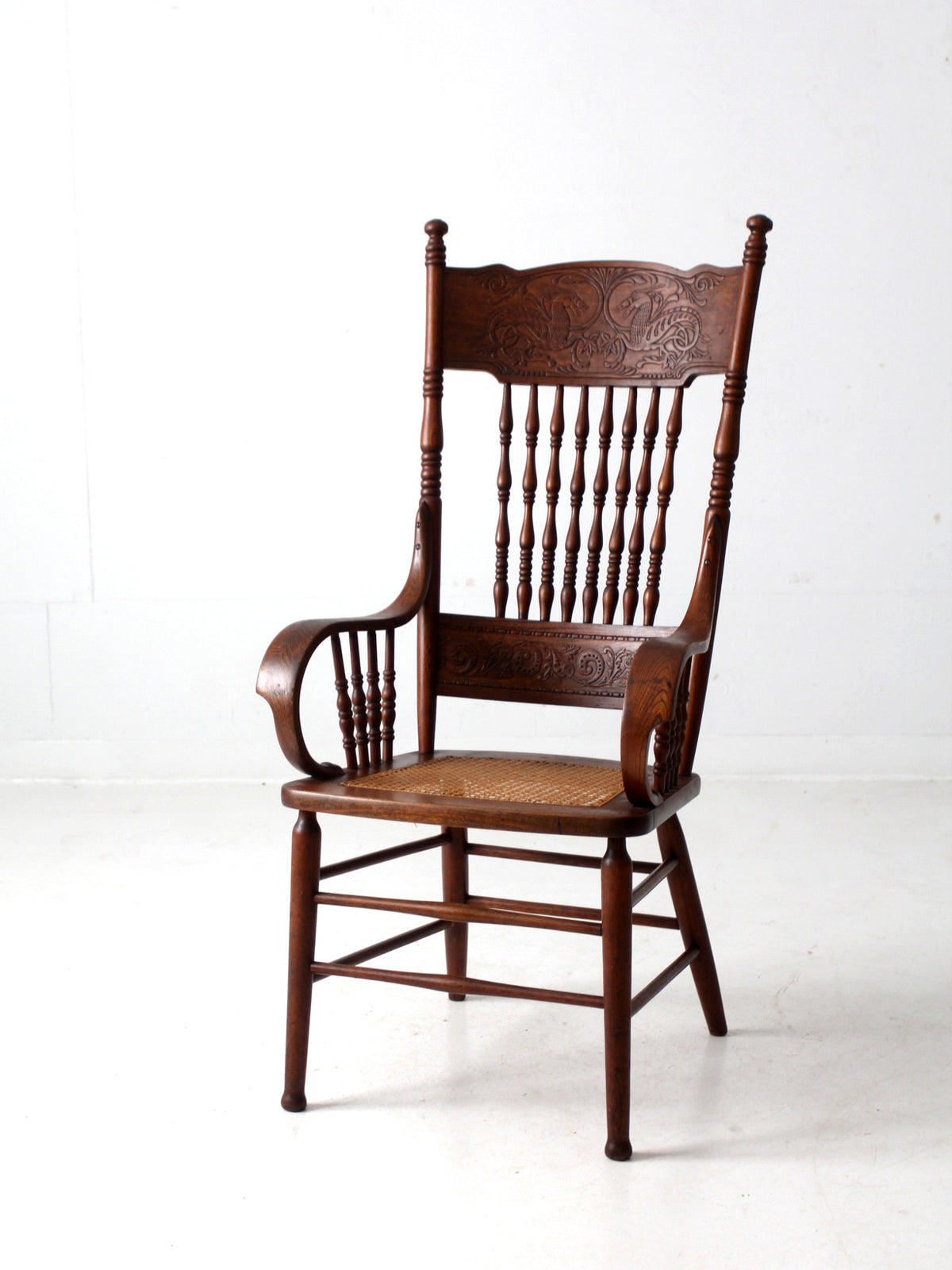 antique pressed back armchair