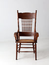 antique pressed back armchair