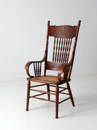 antique pressed back armchair