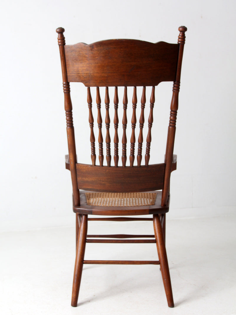 antique pressed back armchair