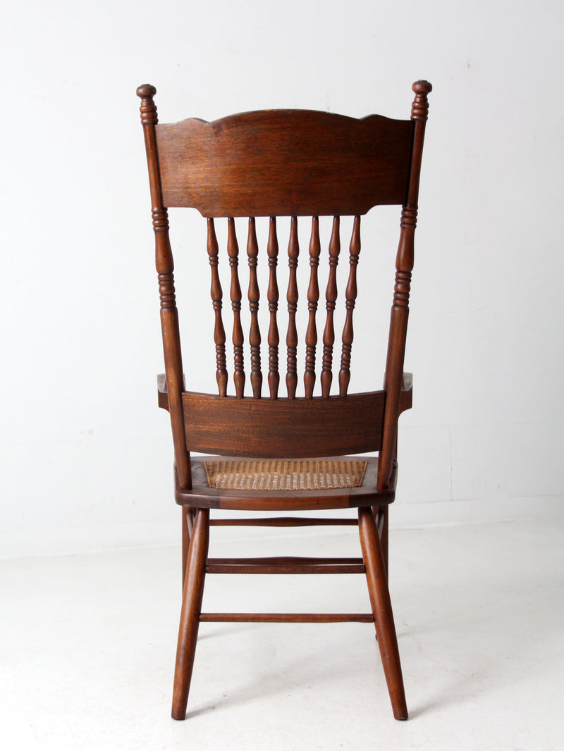 antique pressed back armchair