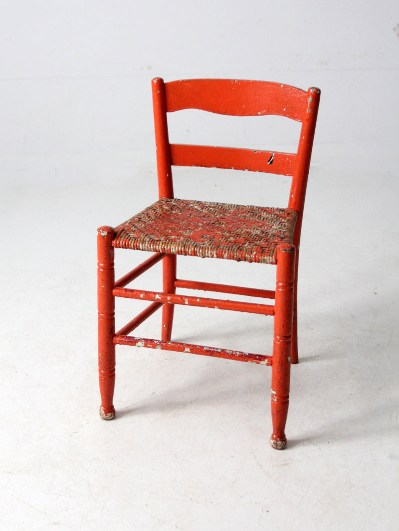 antique rusted painted woven seat chair