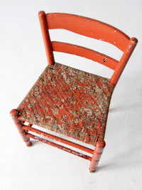 antique rusted painted woven seat chair