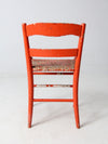 antique rusted painted woven seat chair