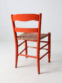 antique rusted painted woven seat chair