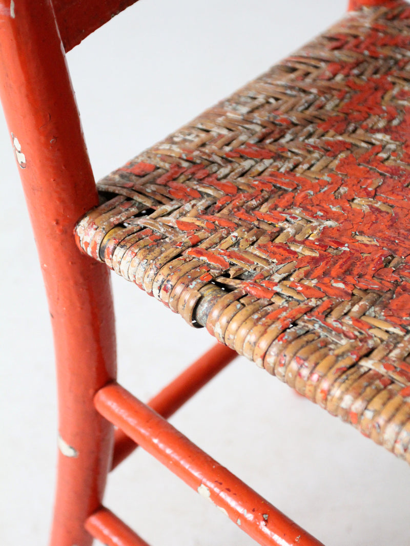 antique rusted painted woven seat chair