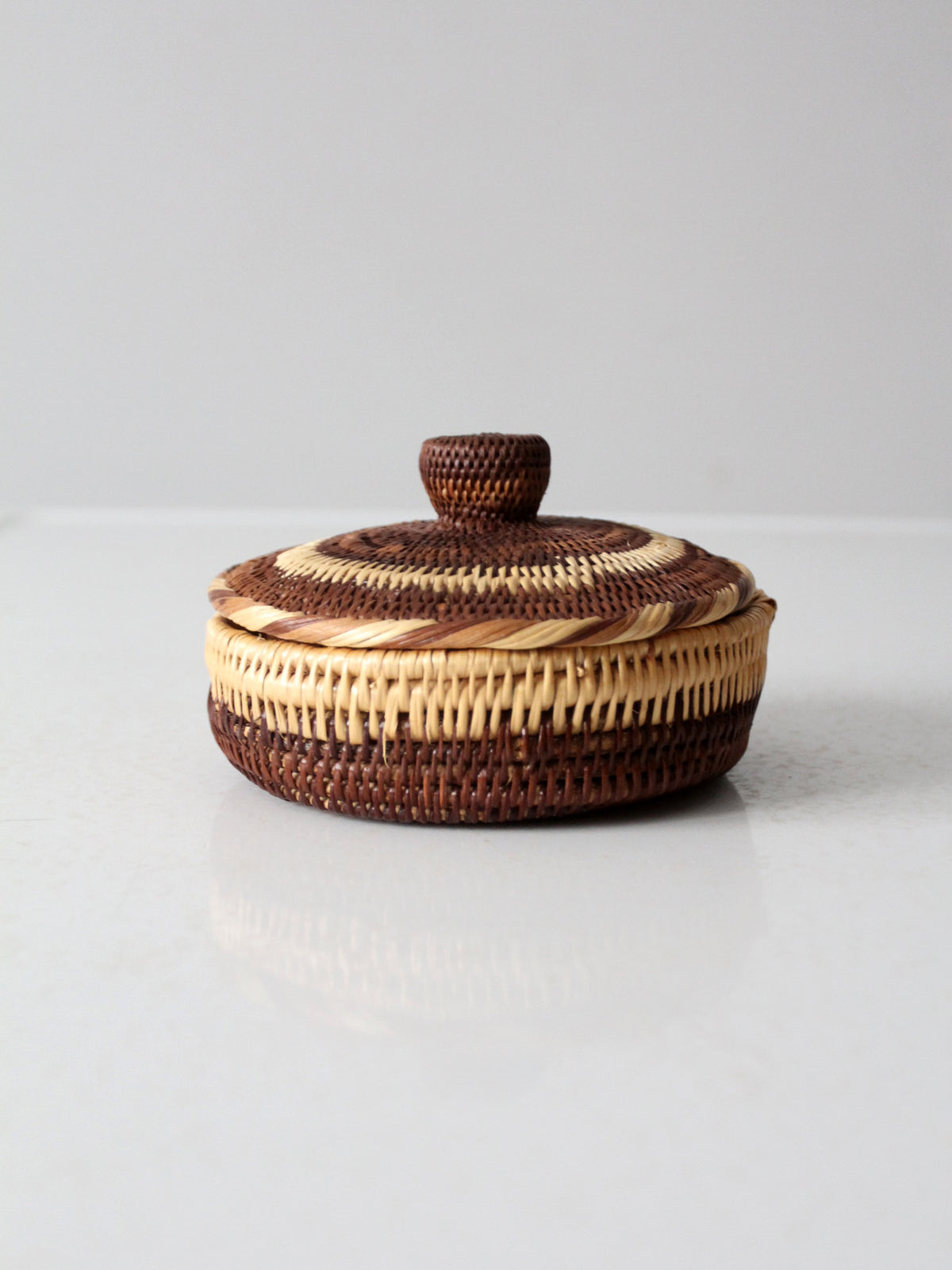 vintage handwoven basket with lid