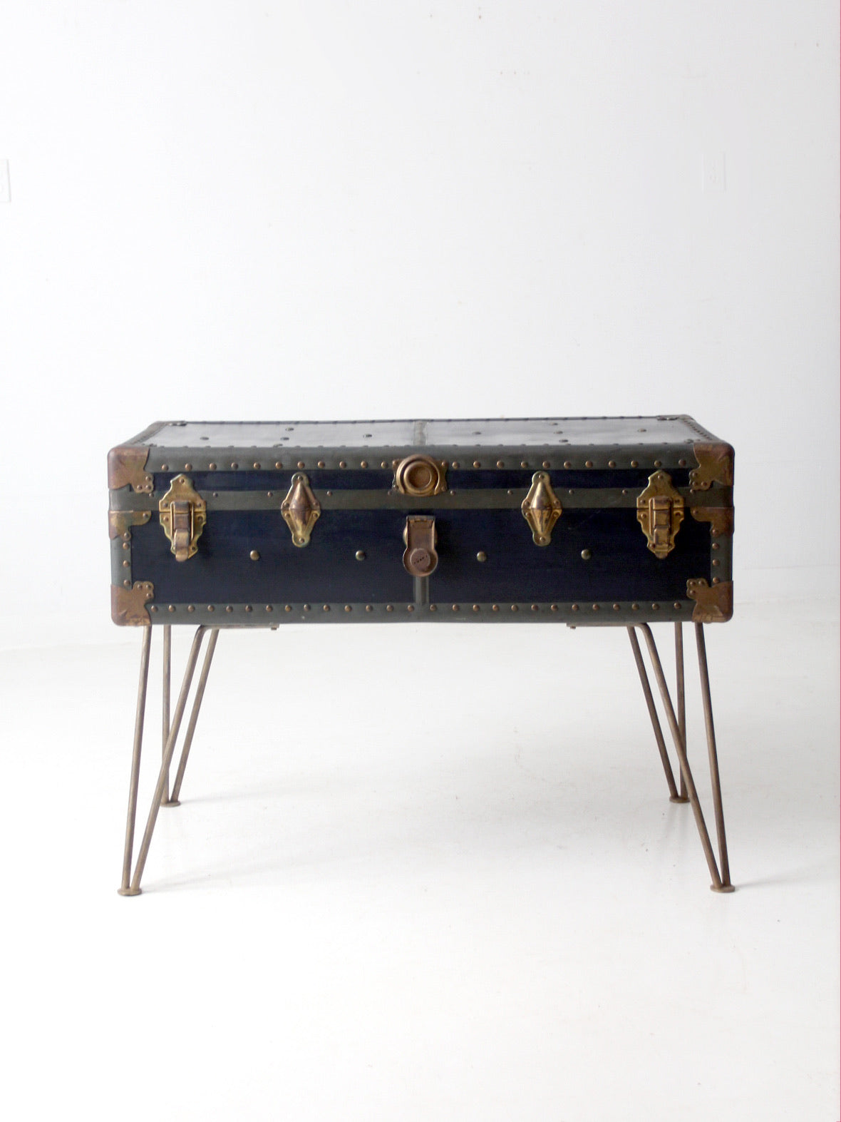 antique steamer trunk with hairpin legs