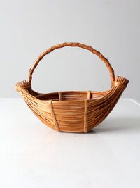 vintage rattan boat shaped basket