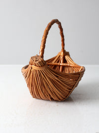 vintage rattan boat shaped basket