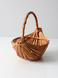 vintage rattan boat shaped basket