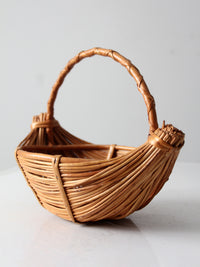 vintage rattan boat shaped basket