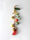 vintage ceramic fruit on rope hanging