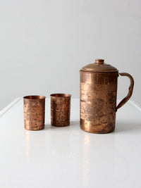 vintage copper pitcher and cups set