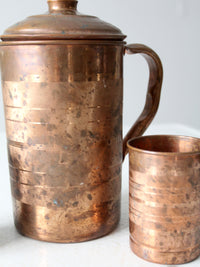 vintage copper pitcher and cups set