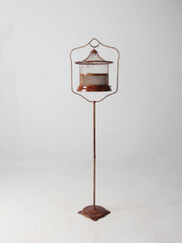 antique lacquered metal birdcage with stand