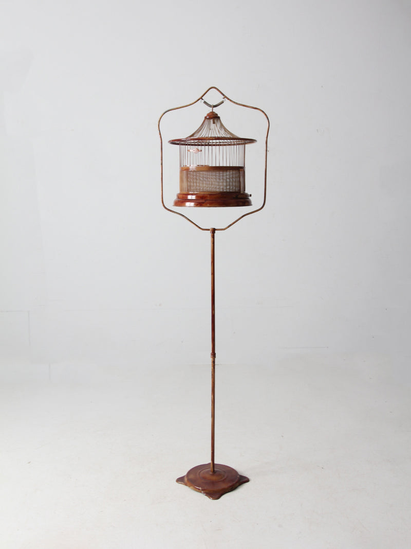 antique lacquered metal birdcage with stand