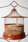 antique lacquered metal birdcage with stand