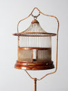 antique lacquered metal birdcage with stand