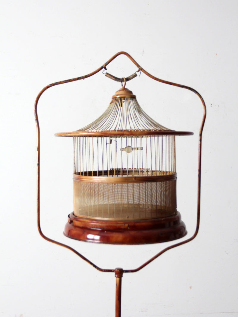 antique lacquered metal birdcage with stand