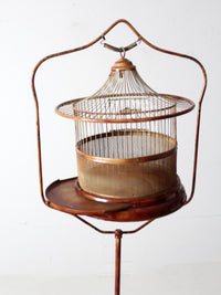 antique lacquered metal birdcage with stand