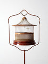 antique lacquered metal birdcage with stand