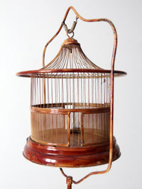 antique lacquered metal birdcage with stand