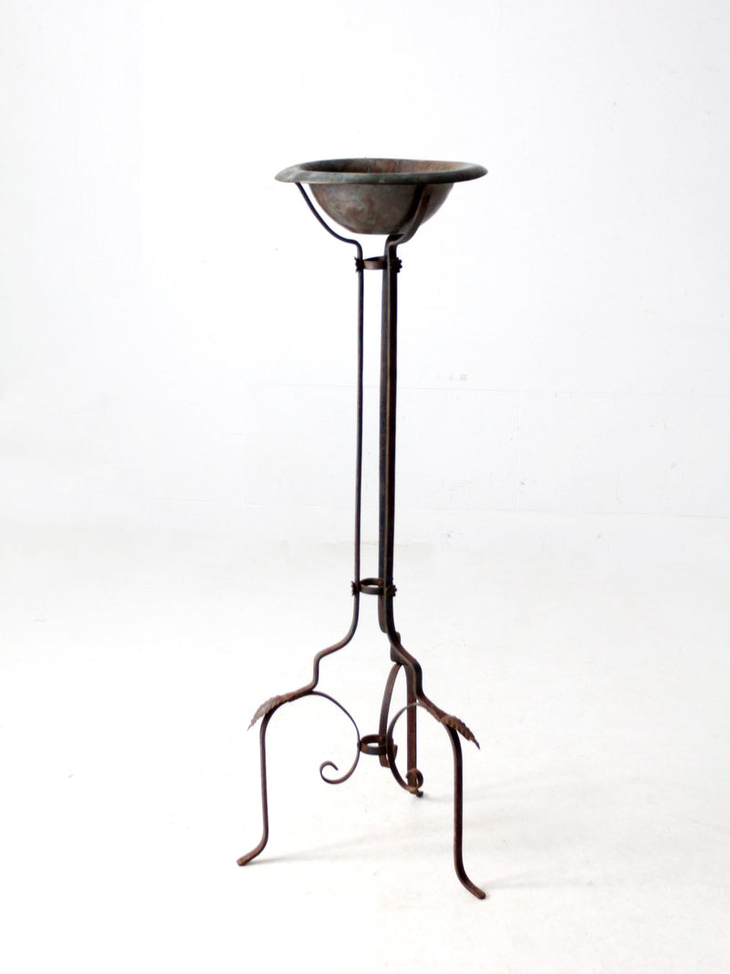 antique wrought iron plantstand with copper bowl