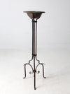 antique wrought iron plantstand with copper bowl