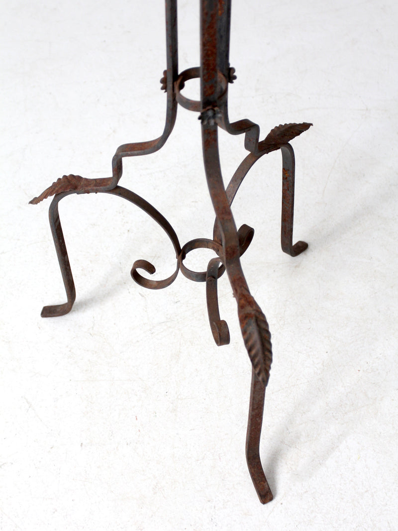 antique wrought iron plantstand with copper bowl