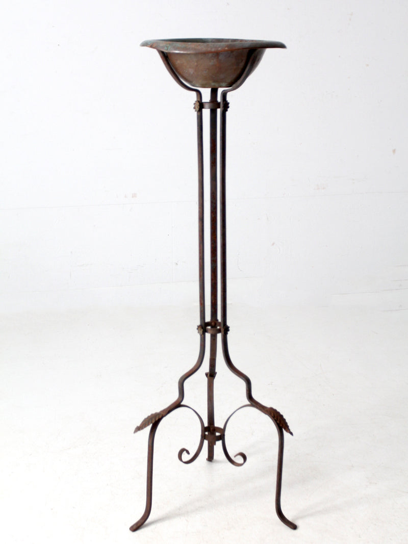 antique wrought iron plantstand with copper bowl