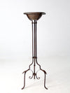 antique wrought iron plantstand with copper bowl