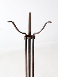 antique wrought iron plantstand with copper bowl