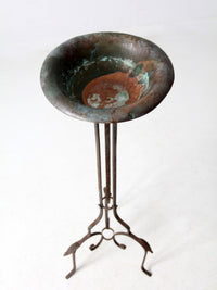 antique wrought iron plantstand with copper bowl