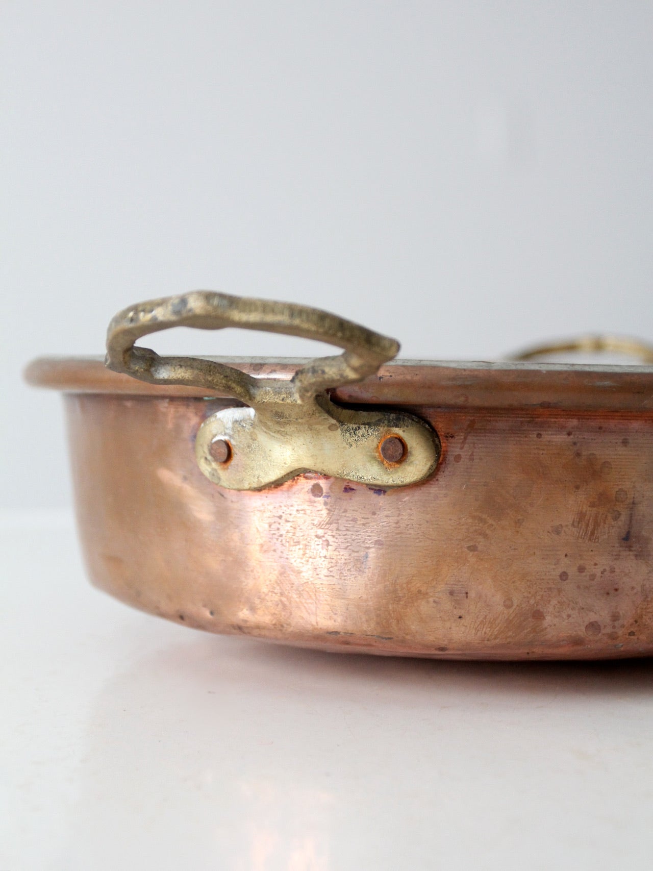 Heavy discount antique copper coupe/pan with decorated edges and handles. Handmade.