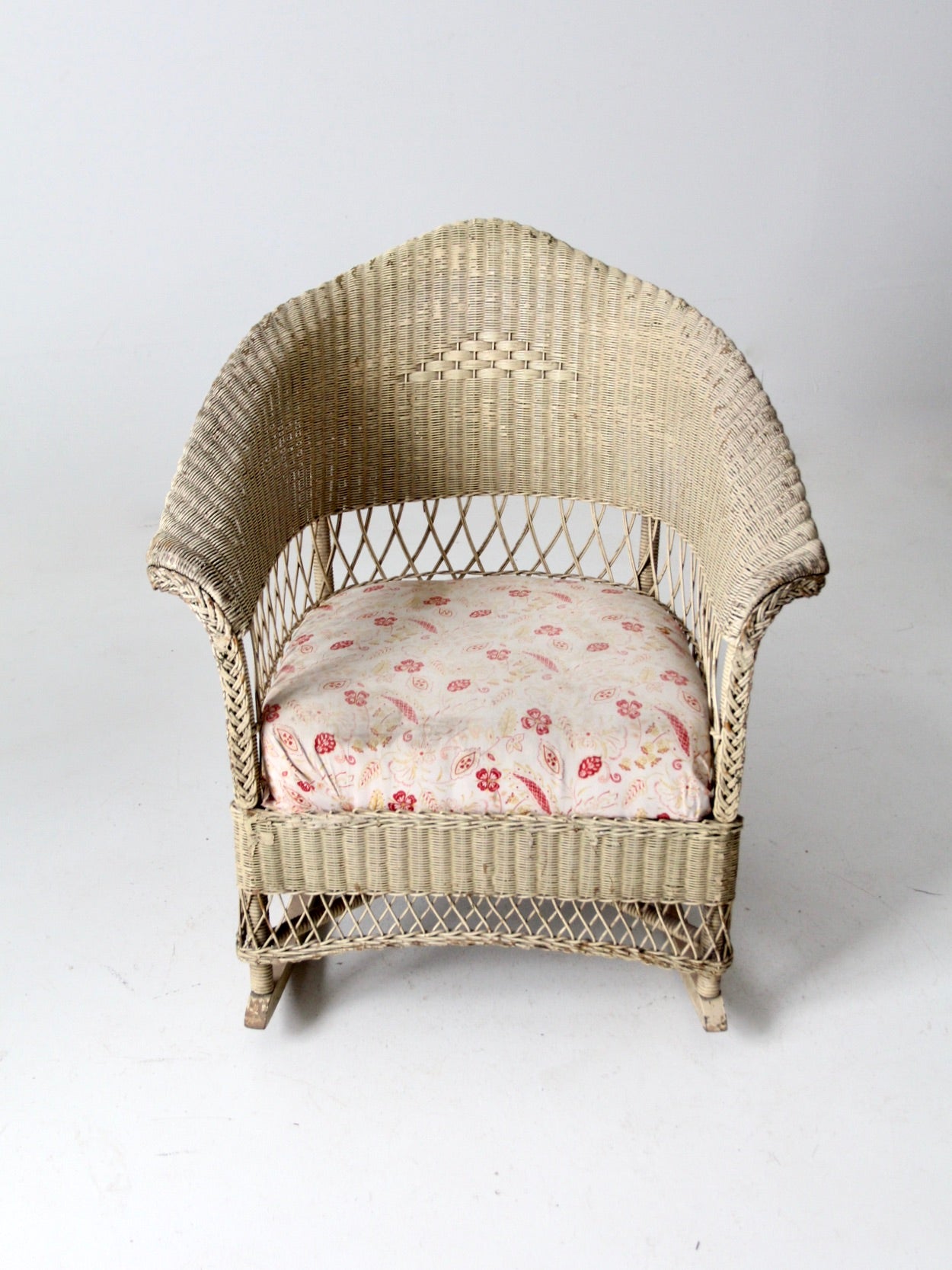 Antique wicker rocker discount with spring seat