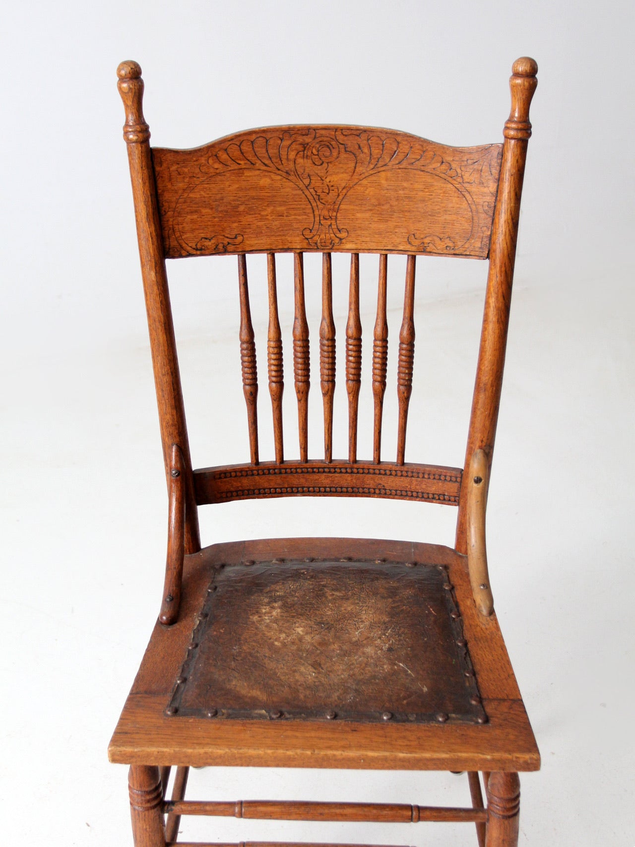 antique pressed back chair with leather seat 86 Vintage