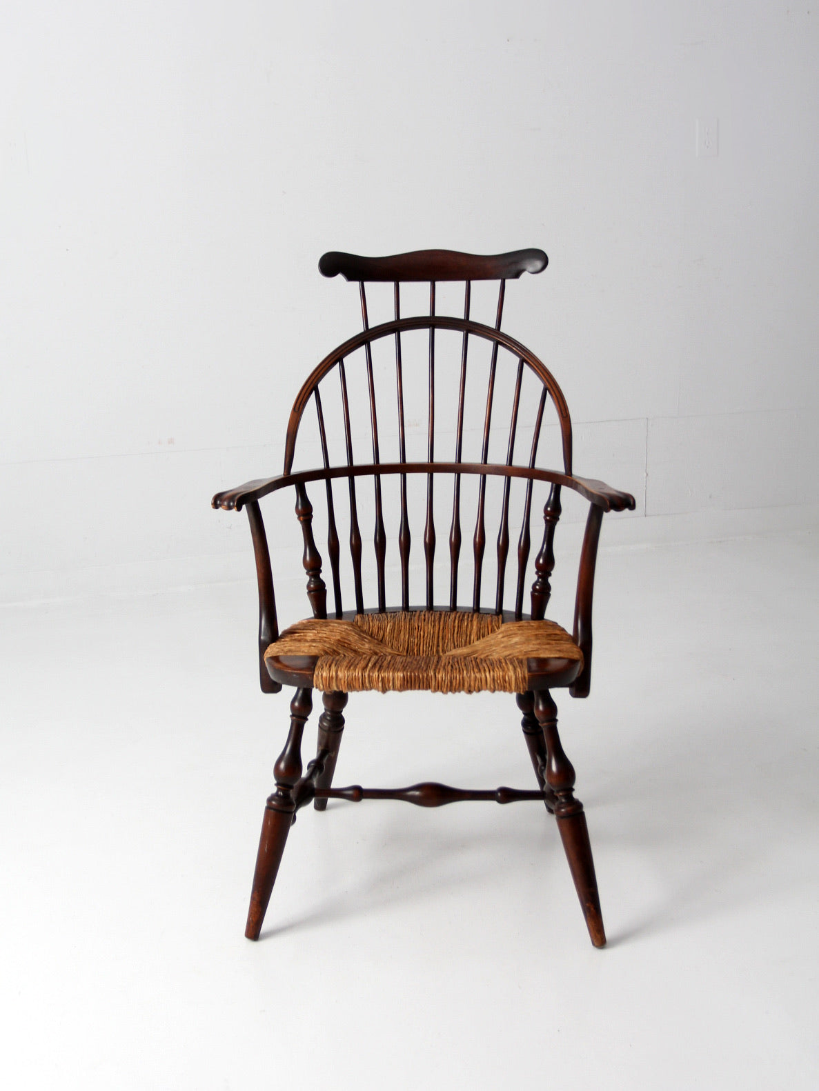 antique Windsor arm chair with rush seat