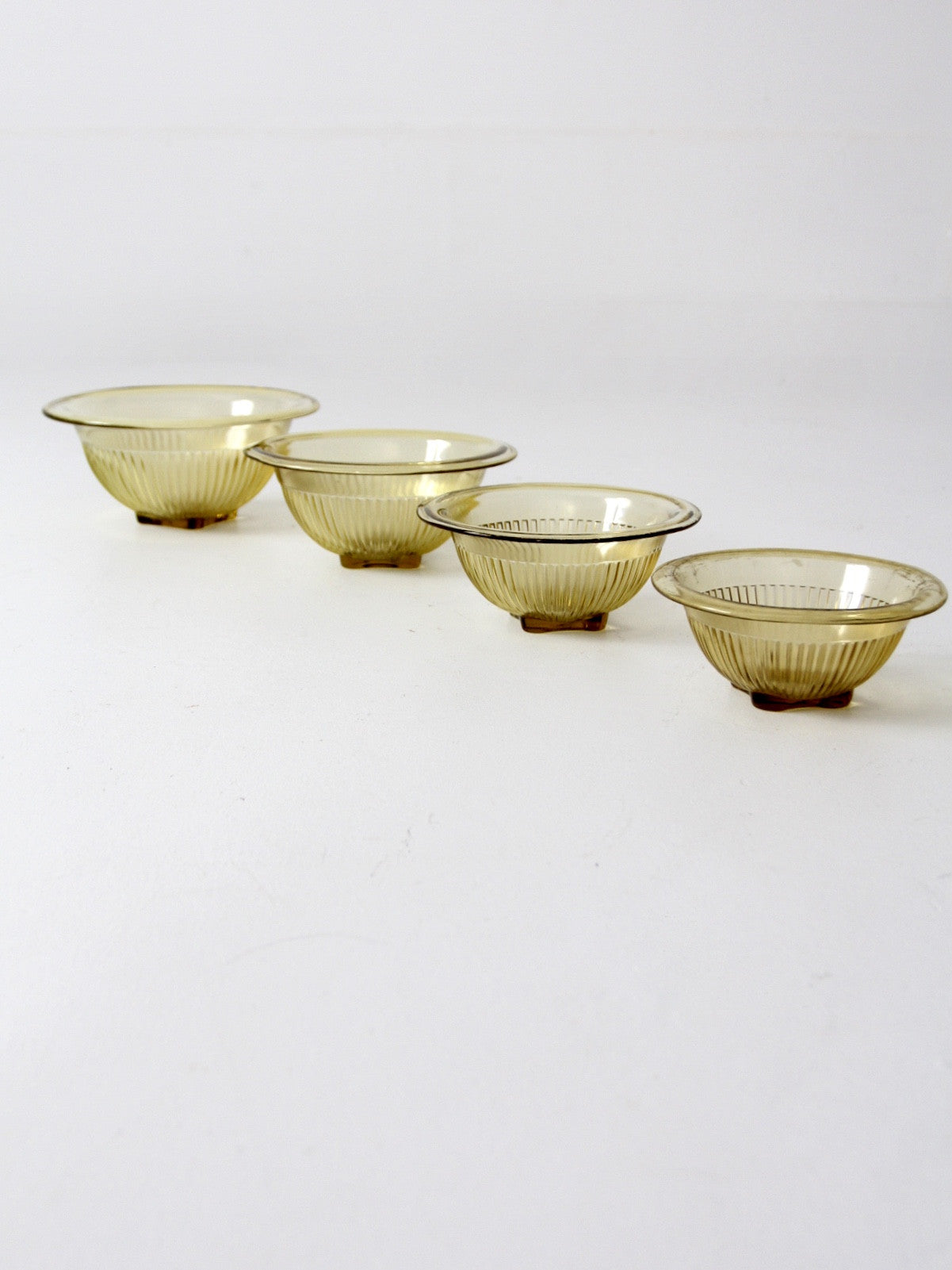 Federal Glass Co. mixing bowl set of 4 amber glass bowls circa