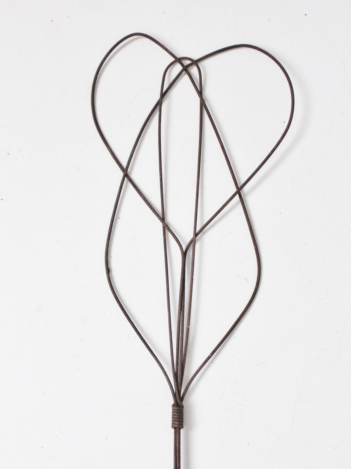 Sold at Auction: Vintage twisted wire rug beater